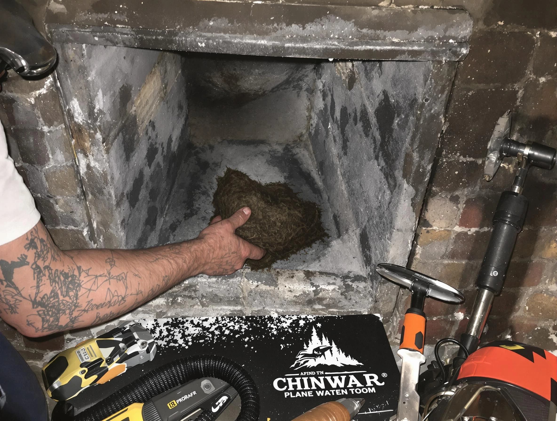 Spanish Fork Chimney Sweep safely removing debris and screening chimney in Spanish Fork, UT